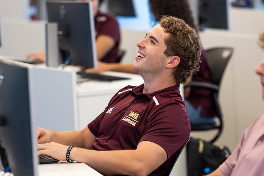 Two business students in an accounting class.