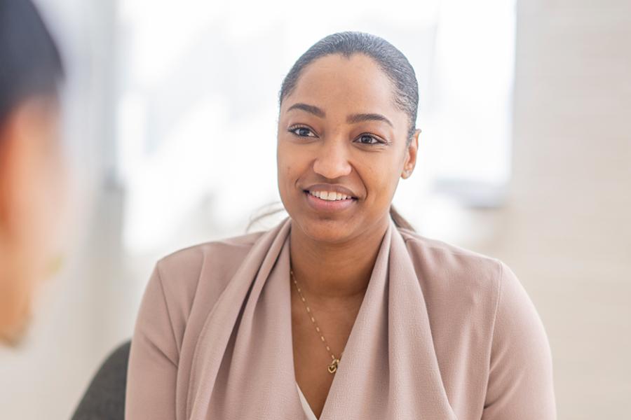 A social worker has a session with a client.