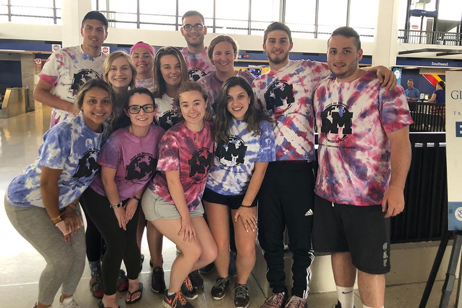 A group of Mission and Ministry at an airport.