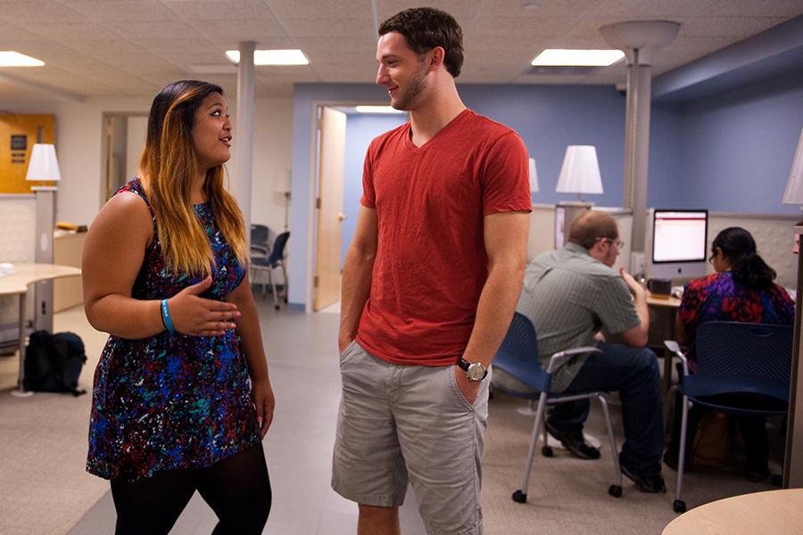 Two students have a discussion at the Rudin Center.