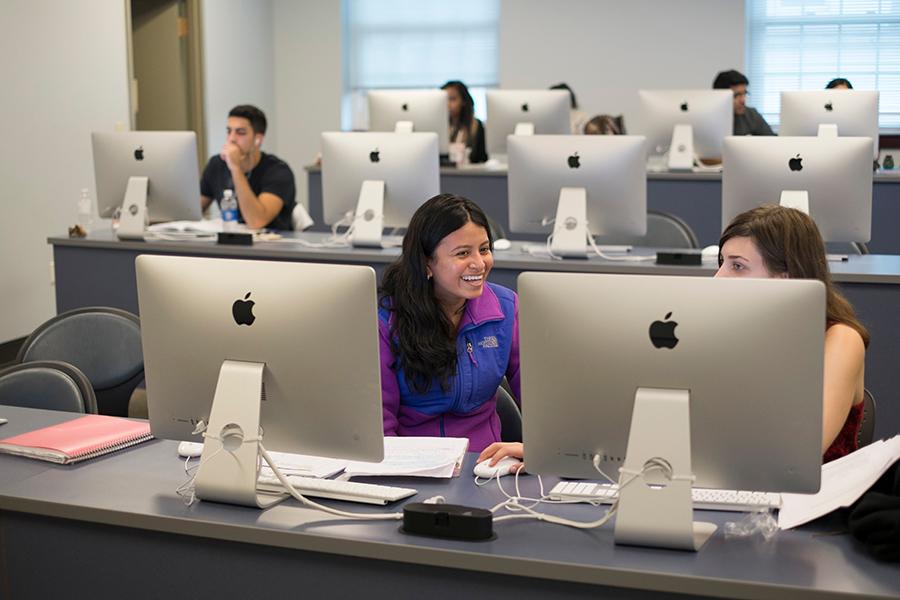 Students do research for computer science in the lab.