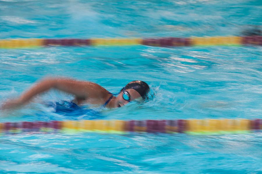 A swimmer does the freestyle stroke in the Hynes Pool.