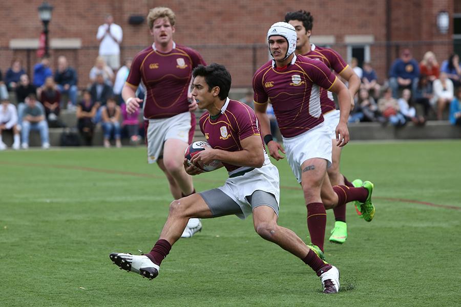 The Iona rugby team runs down field.