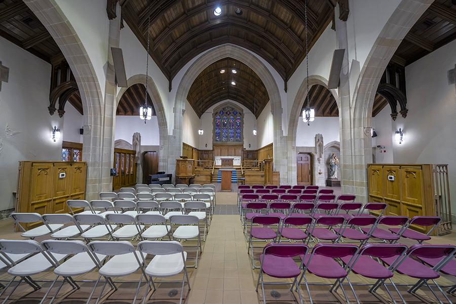 Arrigoni Center set up with chairs.