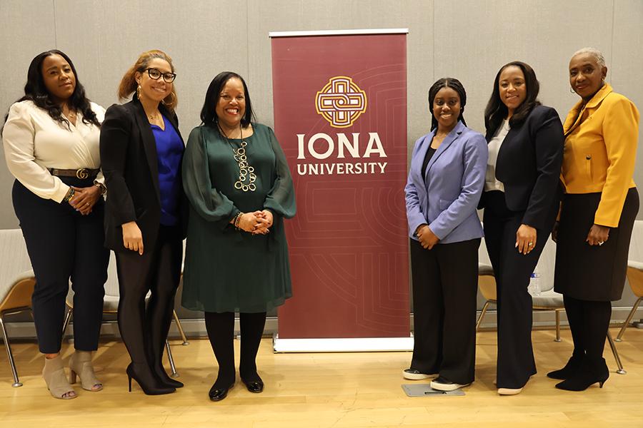 Dr. Munsch with panelists at the Black History Month Alumni Panel.