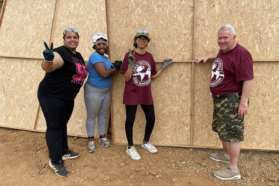 Iona in Mission building a house in Peru.