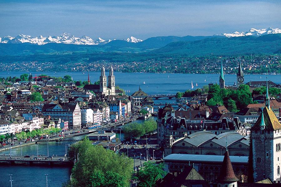 Zurich, Switzerland, with the Alps in the background.