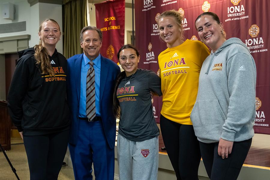 Bruce Beck with Iona students at his talk about the Olympics.