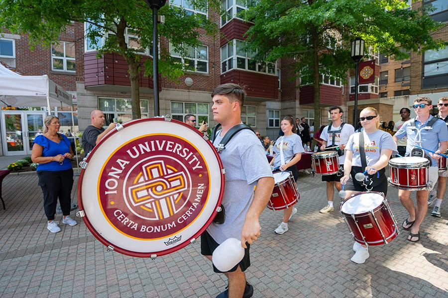 The Pipe Band plays at move-in day.