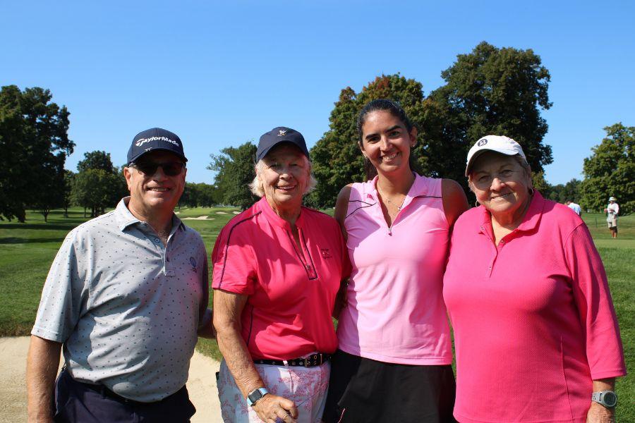 Four golfers gathered at Winged Foot Golf Course