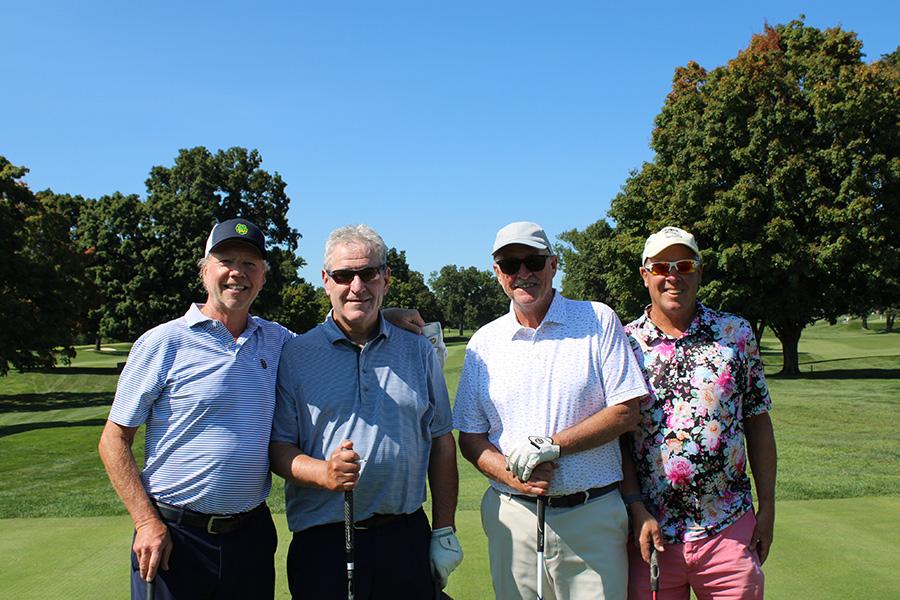 Four golfers at the Wingedfoot Golf outing.