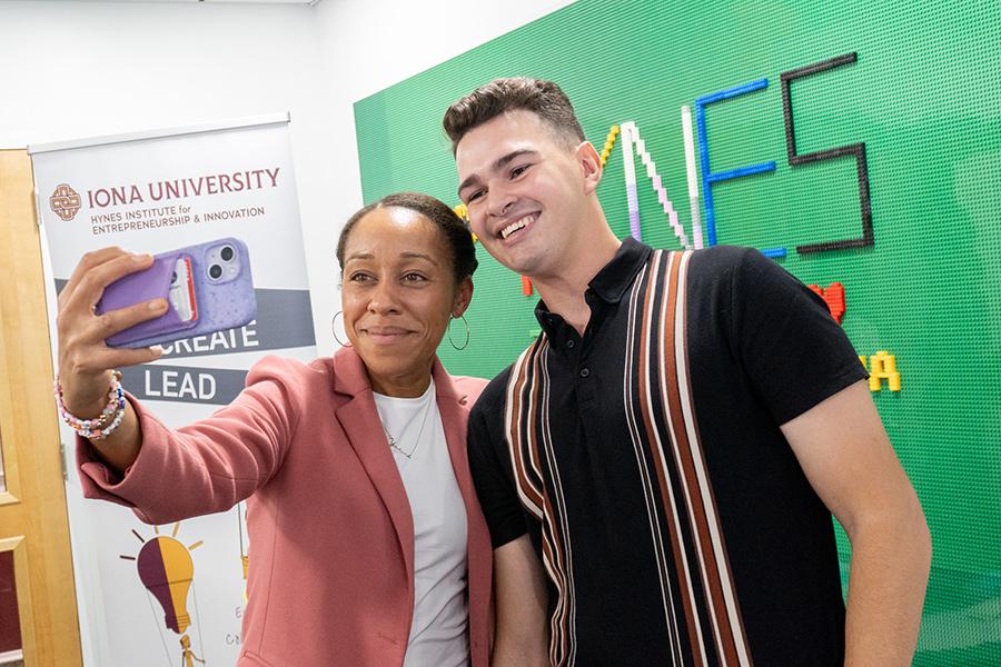 Mayor Ramos-Herbert takes a selfie with a student.