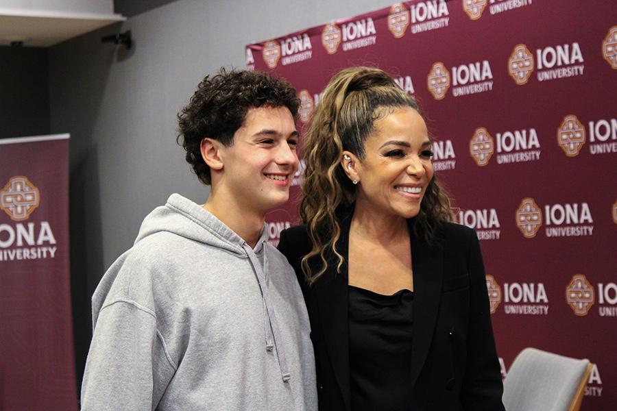 A student takes a picture with Sunny Hostin.