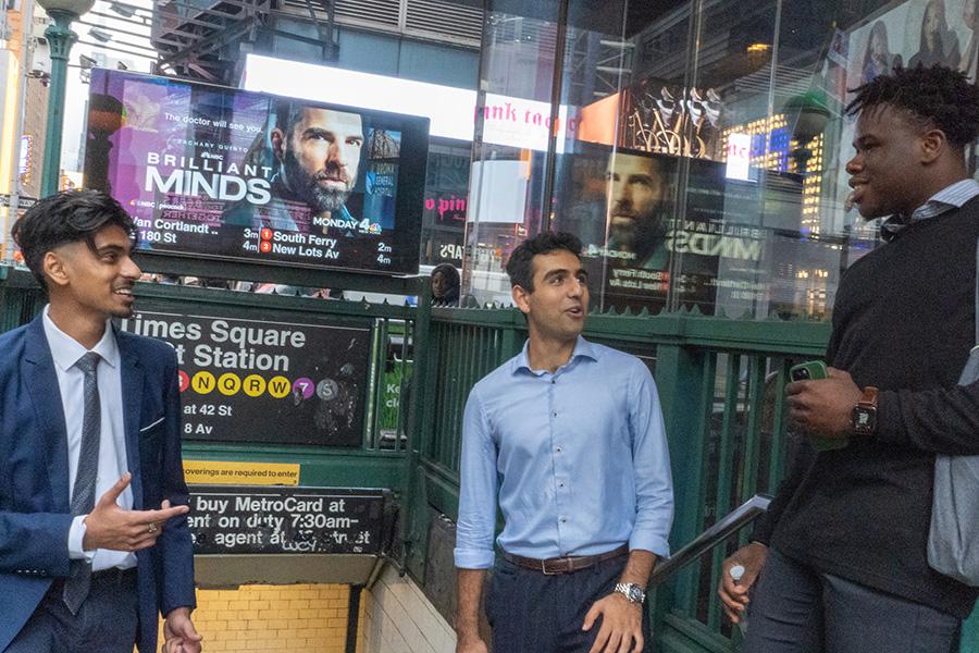 Students at the subway entrance at Times Square.