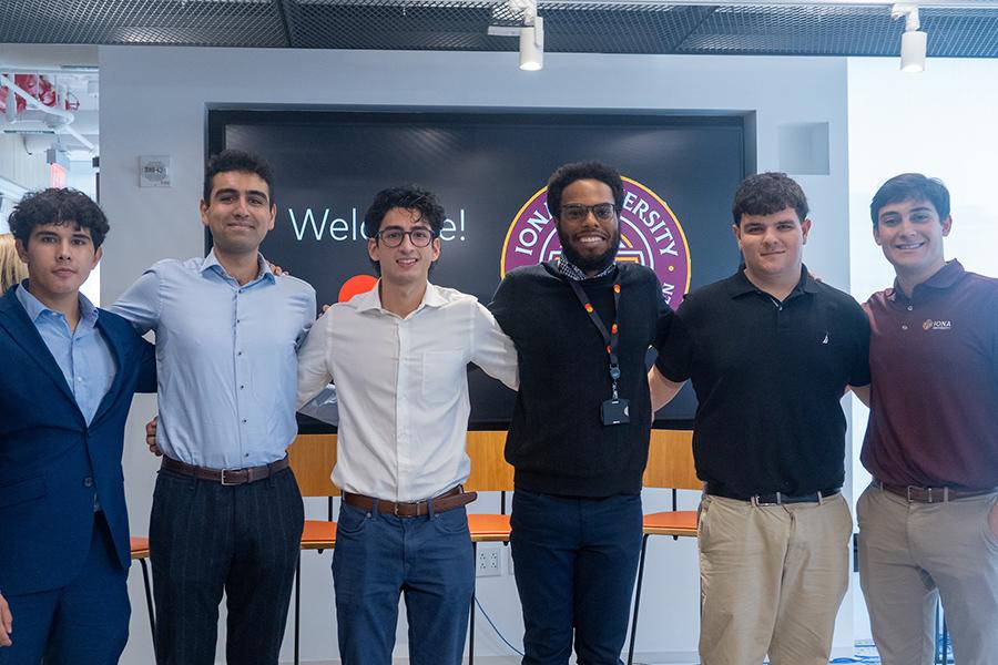 Students smile together at Mastercard.