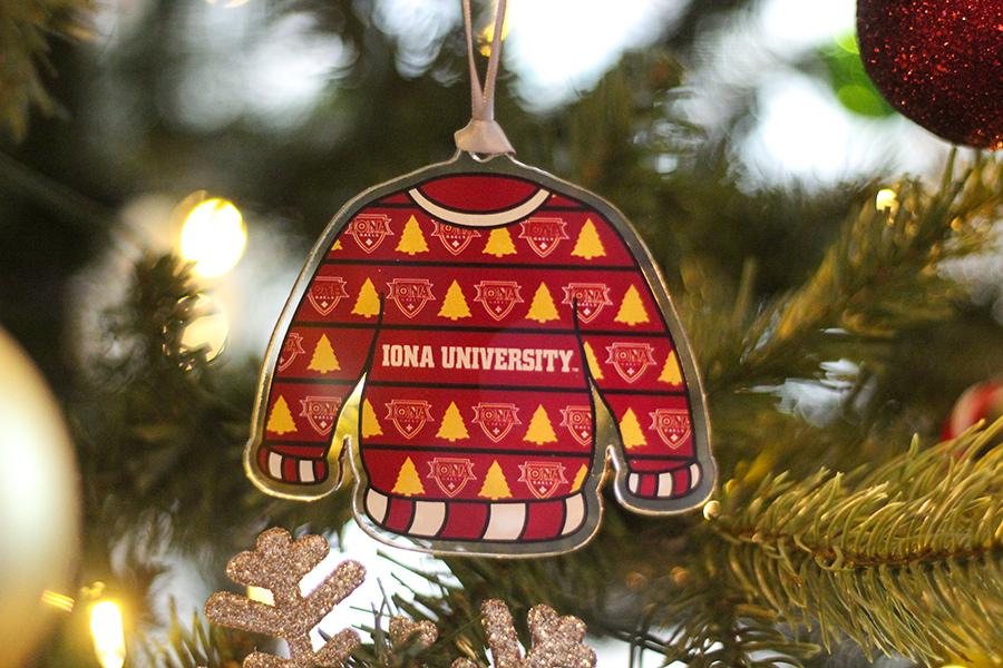 An Iona University holiday sweater Christmas ornament.