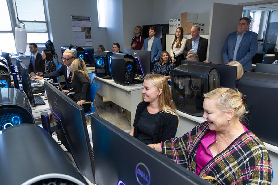 The Powers family in the computer science room.