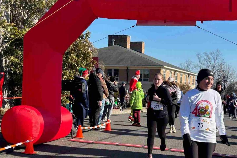 running club passing finish line 