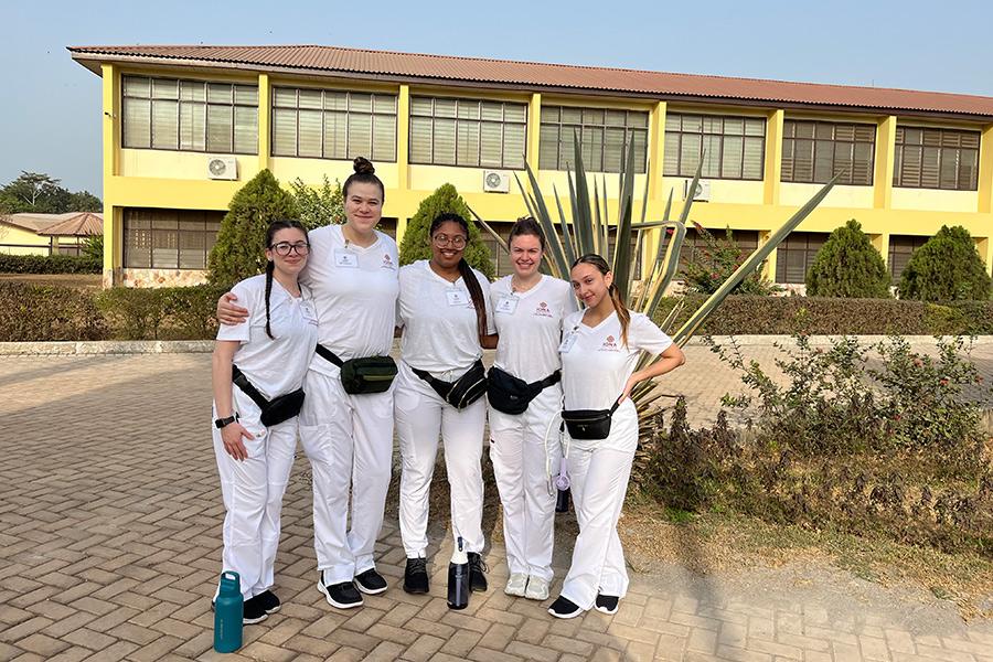 Maria Morano ’24, left, and her fellow nursing students in Ghana, February 2024