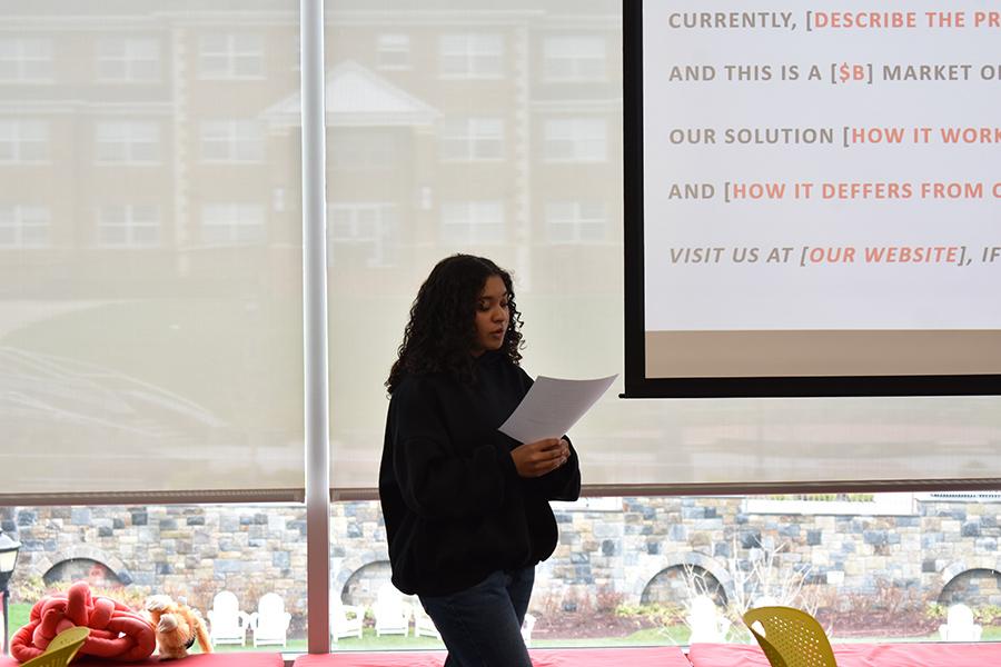 A student practicing her elevator pitch.