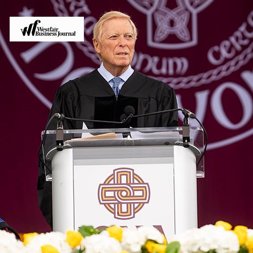 Rep. Dick Gephardt speaking at Commencement with the Westfair logo in the corner.