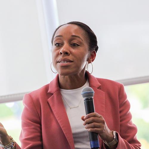 Yadira Ramos-Herbert speaking at the Hynes Institute.