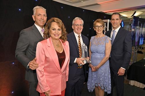 President Carey at the 2023 BCW awards with other attendees. 