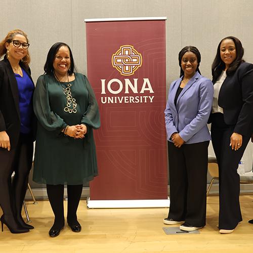 Dr. Munsch with panelists at the Black History Month Alumni Panel.