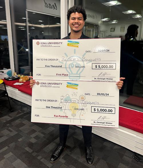 Jared Balcacer with this Iona Innovation prizes.