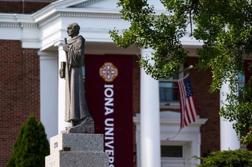 The St. Columba statue in front of McSpedon Hall.