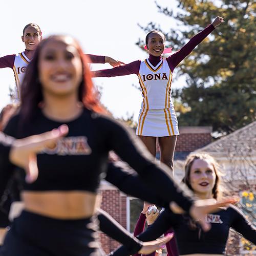 The dance and cheer team at Homecoming on Mazzella Field.