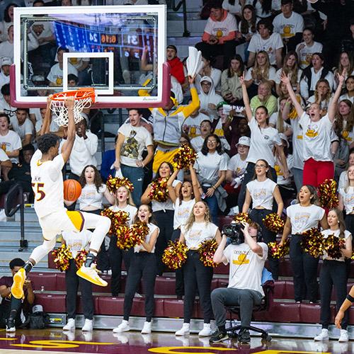 Shema dunking at a game.