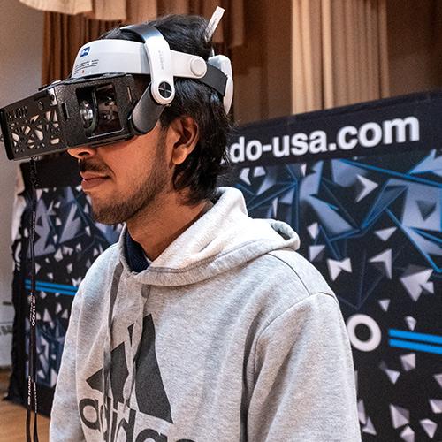 A HADO player with the VR headset on.