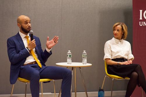 Two alumni panelists at the Black History Month event.