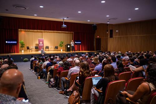 John Warner speakers to a full room at the conference.